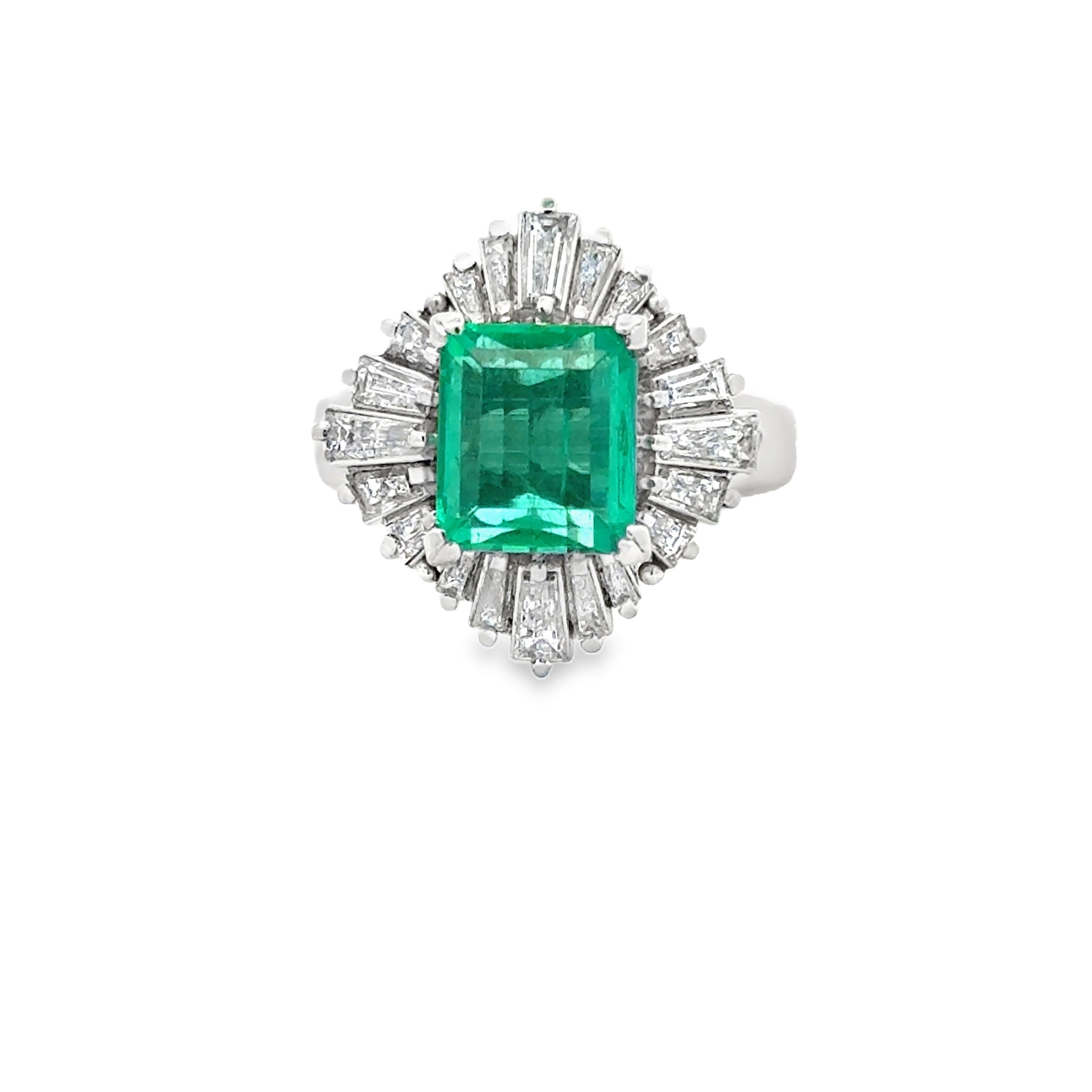 Estate Ring, 20 Baguette Cut Diamonds 1.09ct H-J VS1-VS2, 1 Emerald Emerald Cut 2.65ct Green Columbia Minor Modern, Platinum 11.52g. All Weights Estimated.