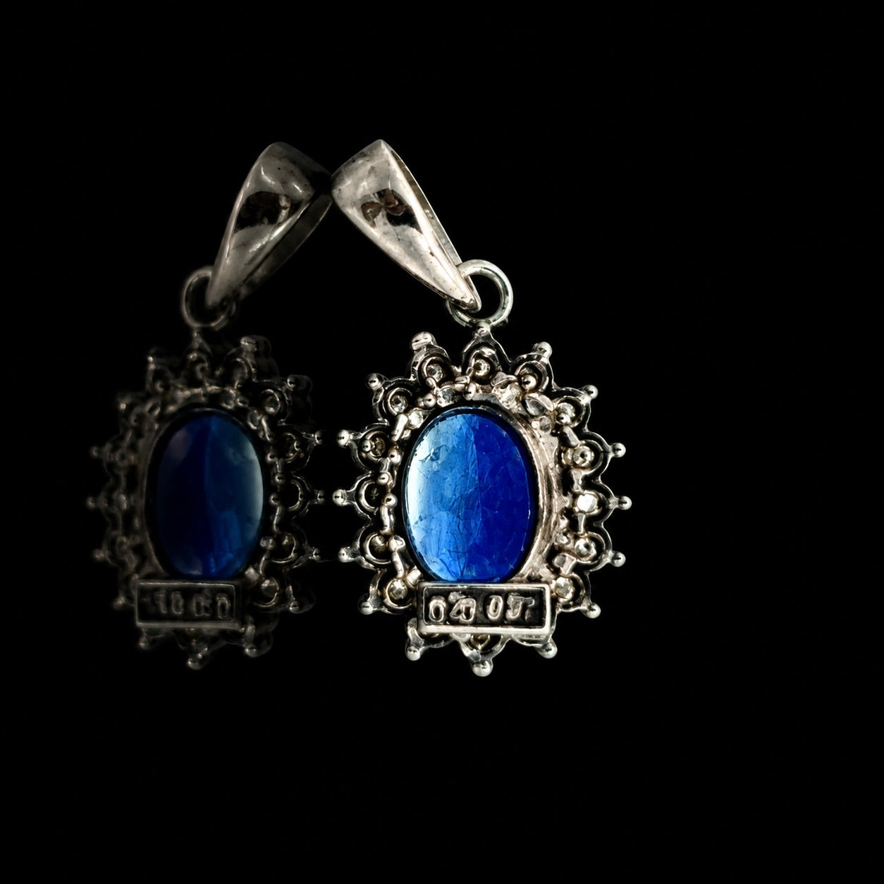 Estate Pendant, Round Brilliant Cut Diamond 0.20 cttw  G-H SI1-SI2,1 Sapphire Oval 0.97 ct  Platinum 1.52g. All Weights Estimated.