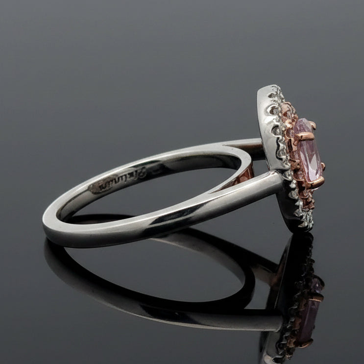 Estate Ring, 1 Oval Diamond .53ct  Fancy Purple-Pink I1 GIA #5182469614, 14 Round Brilliant Cut Diamond 0.12 cttw  Fancy Pink VS1-VS2, 20 Round Brilliant Cut Diamond G VS2-SI1 .20cttw. Platinum 6.63g. All Weights Estimated.