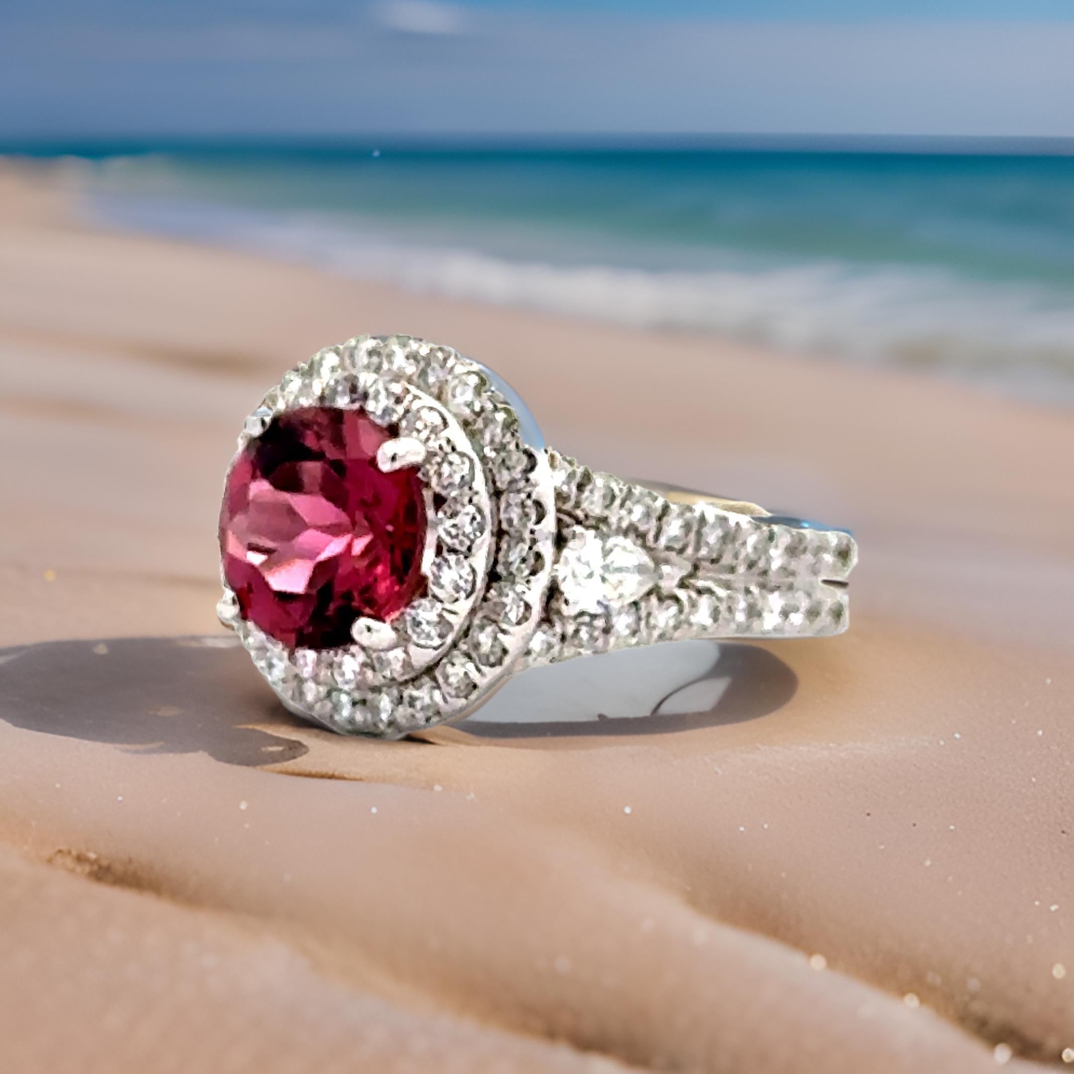 Estate Ring, 1 Round Tourmaline 2.03 ct, 2 Pear Shape Diamond G-H VS2 0.24 cttw, 110 Round Diamond G-H VS2 1.30 cttw, 18K White Gold 8.89g. Size 6.5