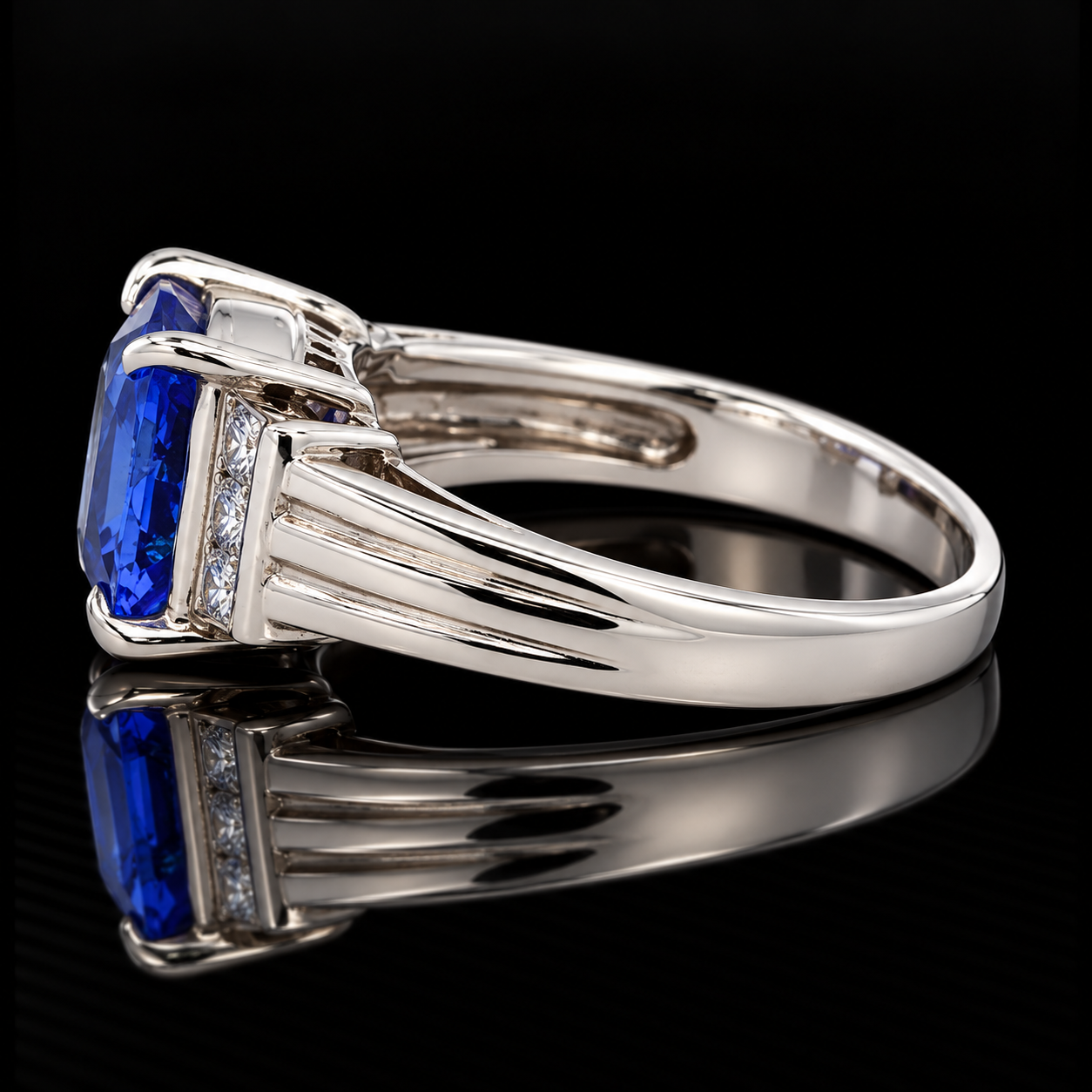 Estate Ring, 6 Princess Cut Diamond 0.28 cttw  G-H VS1-SI1,1 Tanzanite Cushion Modified 3.18 ct  Platinum 6.66g. All Weights Estimated.