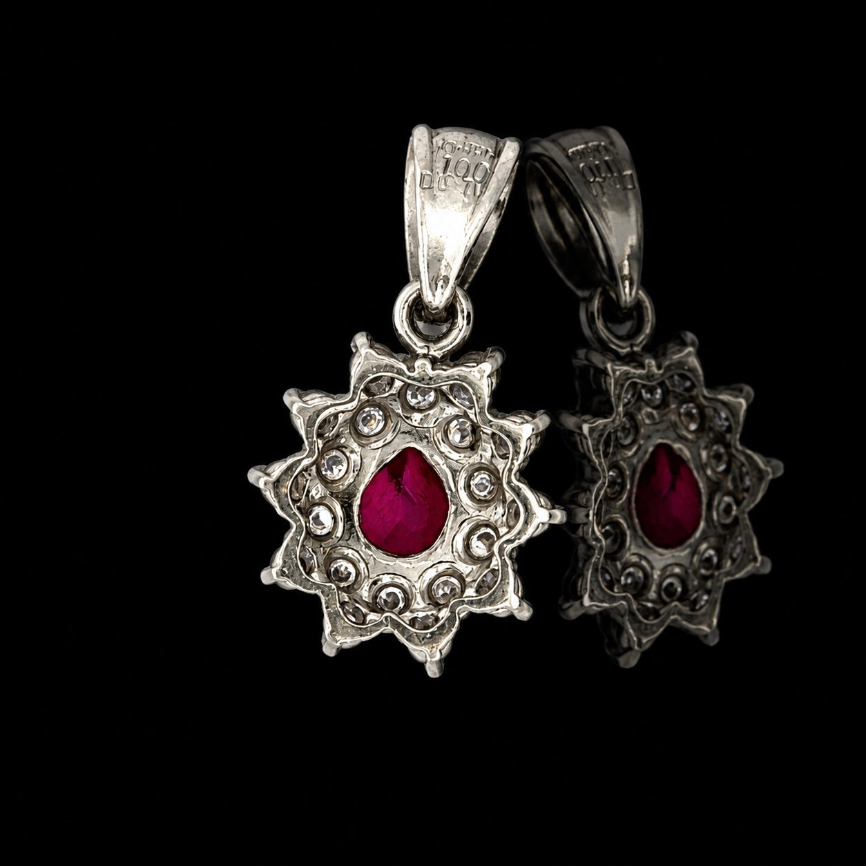Estate Pendant, Round Brilliant Cut Diamond 0.71 cttw  G-H VS1-SI1,1 Ruby Pear Shape 1.00 ct  Platinum 3.69g. All Weights Estimated.