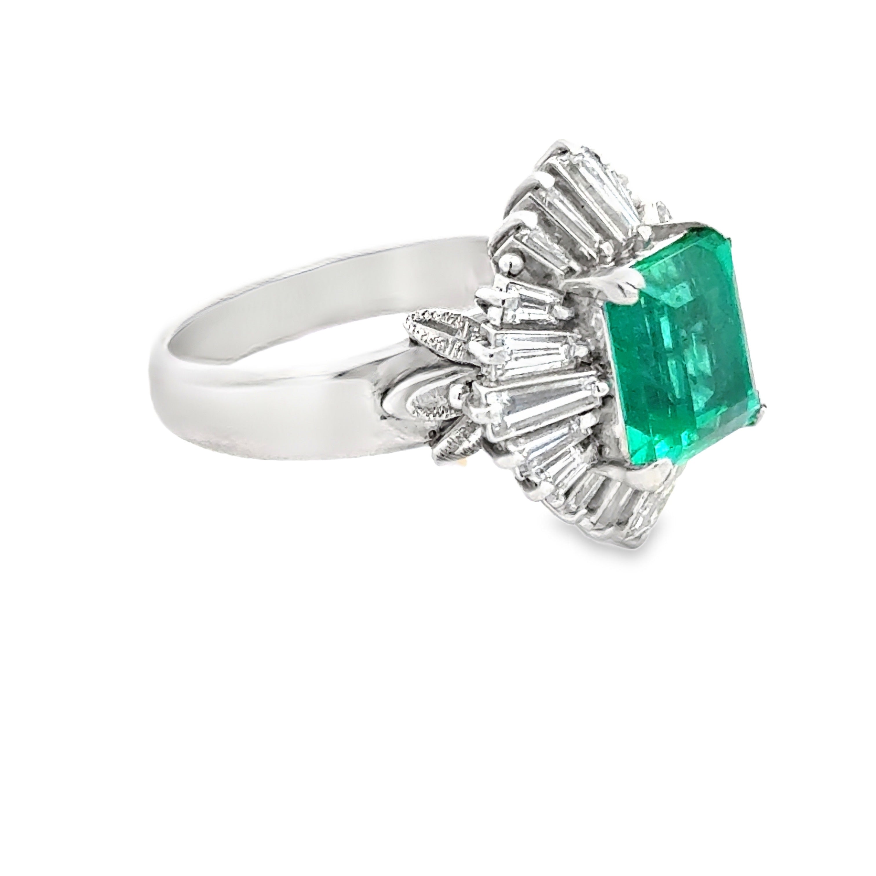 Estate Ring, 20 Baguette Cut Diamonds 1.09ct H-J VS1-VS2, 1 Emerald Emerald Cut 2.65ct Green Columbia Minor Modern, Platinum 11.52g. All Weights Estimated.