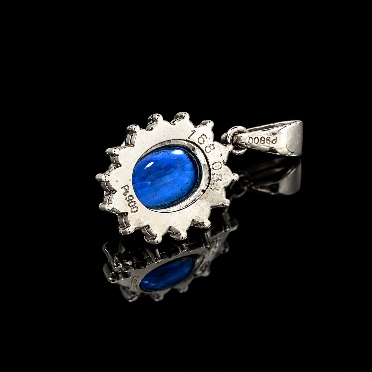Estate Pendant, Round Brilliant Cut Diamond 0.33 cttw  G-H VS1-SI1,1 Sapphire Oval 1.68 ct  Platinum 26.10g. All Weights Estimated.