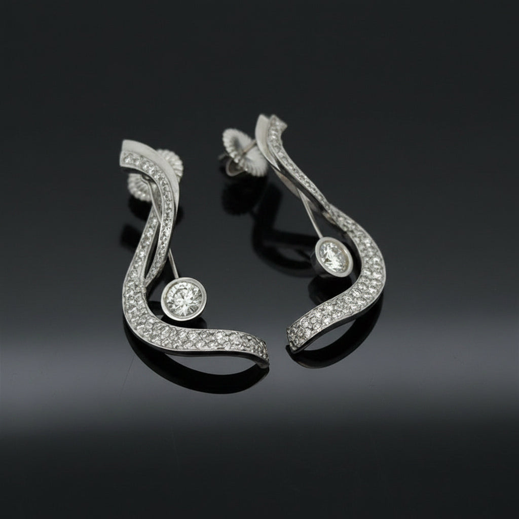 Estate Earrings, 2 Round Brilliant Cut Diamonds 1.18cttw H-I VS2-SI1, Round Brilliant Cut Diamonds 2.00cttw G-H VS2-SI1, 14K White Gold 7.62g. All Weights Estimated.