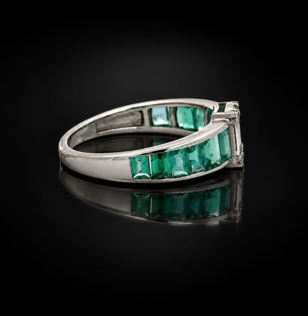 Estate Ring, Round/Baguette Cut Diamond 0.26 cttw  G-H VS1-SI1,14 Emerald Emerald Cut 0 cttw  18K White Gold 2.64g. All Weights Estimated.