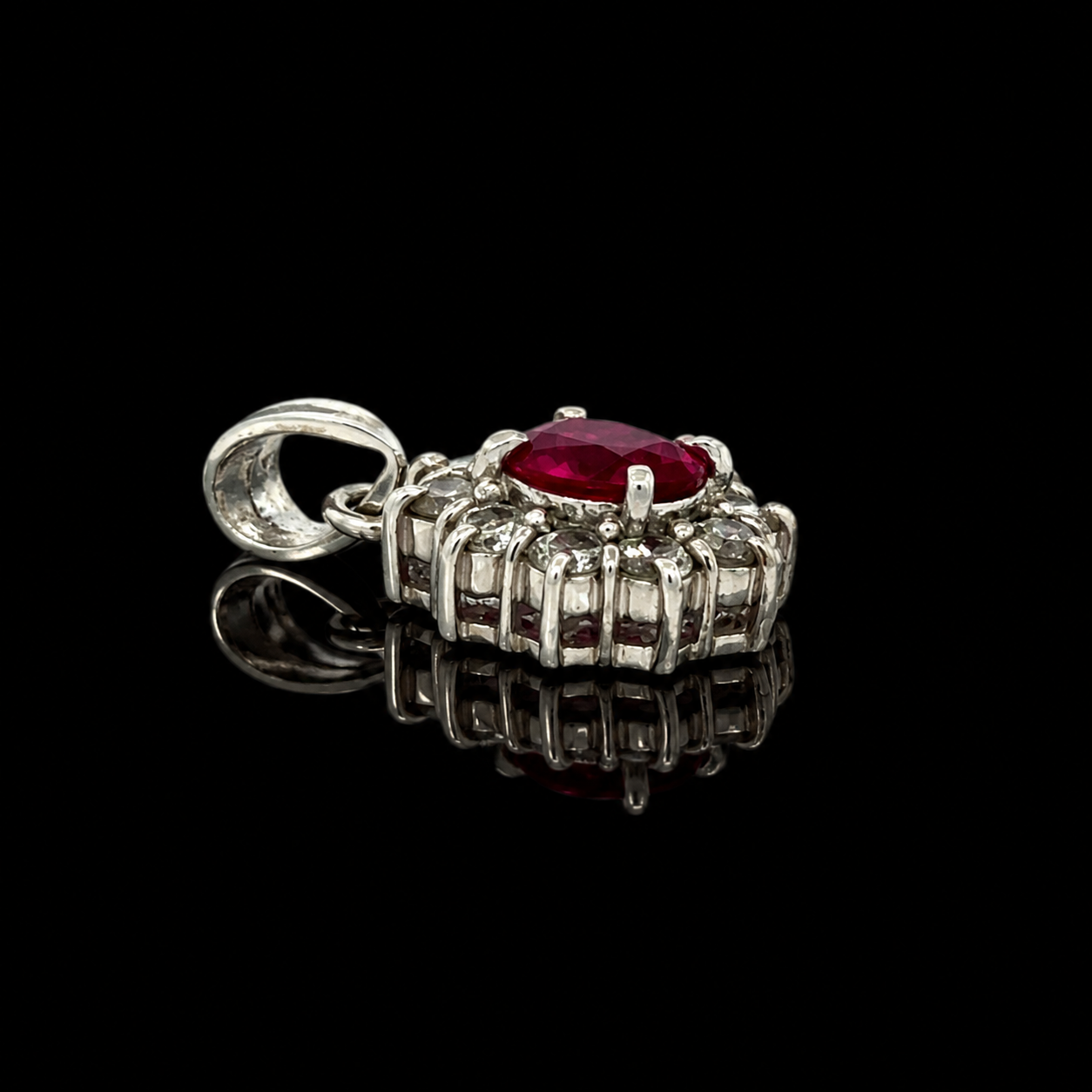 Estate Pendant, Round Brilliant Cut Diamond 0.45 cttw  G-H VS2-SI1,1 Ruby Oval 0.61 ct  Platinum 2.41g. All Weights Estimated.