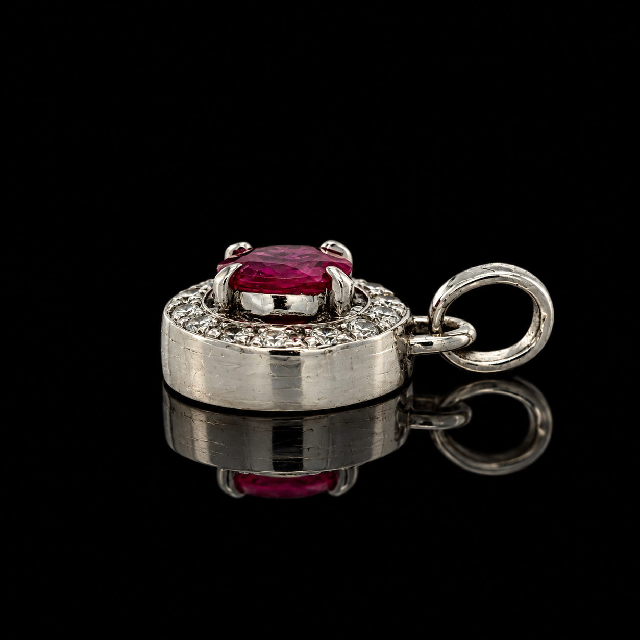 Estate Pendant, Round Brilliant Cut Diamond 0.18 cttw  G-H SI1-SI2,1 Ruby Oval 0.90 ct  Platinum 3.97g. All Weights Estimated.