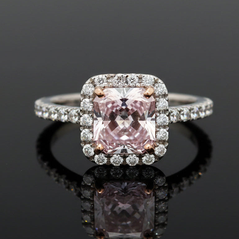 Estate Ring, 1 Radiant Cut Diamond 1.81ct Fancy Light Pinkish Purple SI2 GIA #5222919647, 48 Round Brilliant Cut Diamond 0.63cttw G-H VS2-SI1, 18K/PLAT 4.74g. All Weights Estimated.
