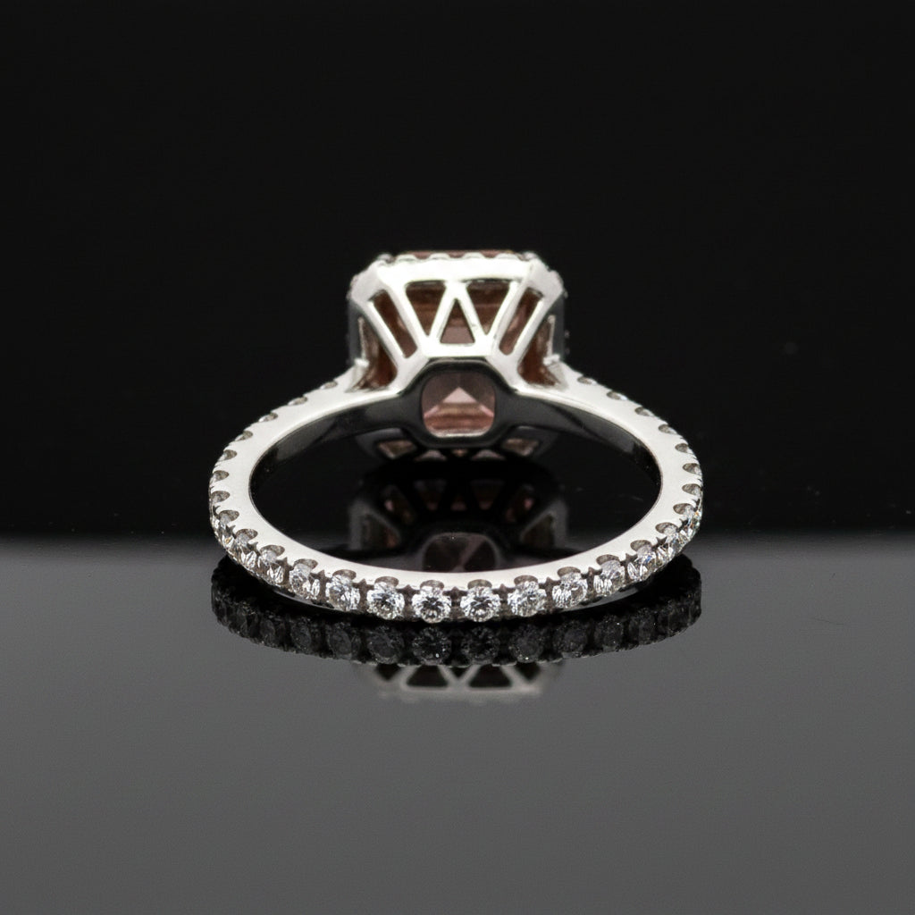 Estate Ring, 1 Radiant Cut Diamond 1.81ct Fancy Light Pinkish Purple SI2 GIA #5222919647, 48 Round Brilliant Cut Diamond 0.63cttw G-H VS2-SI1, 18K/PLAT 4.74g. All Weights Estimated.