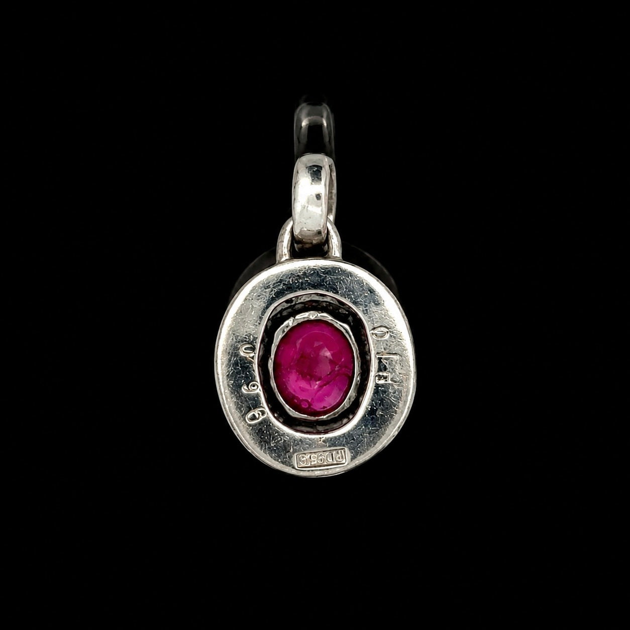 Estate Pendant, Round Brilliant Cut Diamond 0.18 cttw  G-H SI1-SI2,1 Ruby Oval 0.90 ct  Platinum 3.97g. All Weights Estimated.