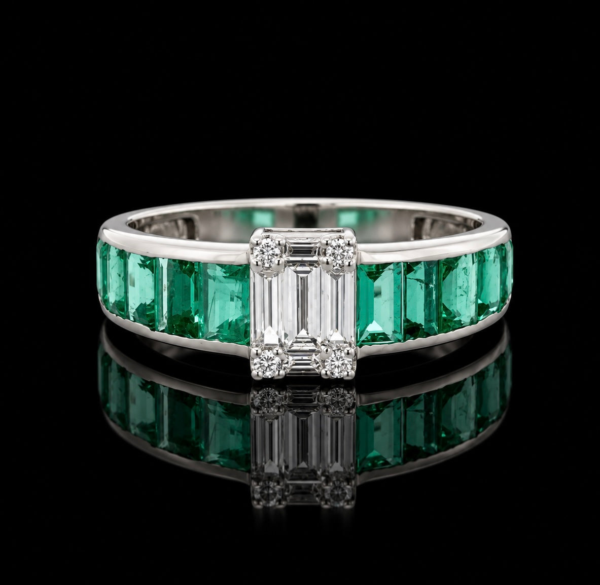 Estate Ring, Round/Baguette Cut Diamond 0.26 cttw  G-H VS1-SI1,14 Emerald Emerald Cut 0 cttw  18K White Gold 2.64g. All Weights Estimated.