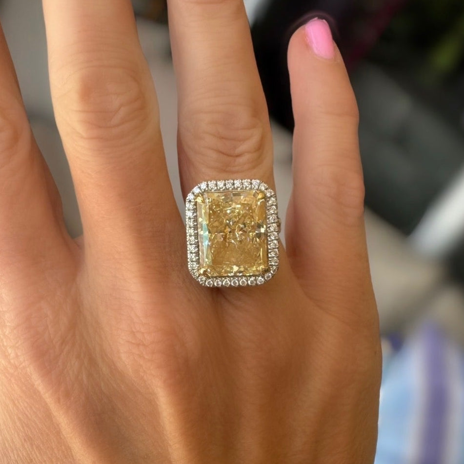 Halo Ring, 1 Radiant Cut Fancy Color Diamond 12.41ct  FYL I1 GIA #2221851314, 54 Round Brilliant Cut Diamond 0.68cttw.  18K White/Yellow Gold 13.09g