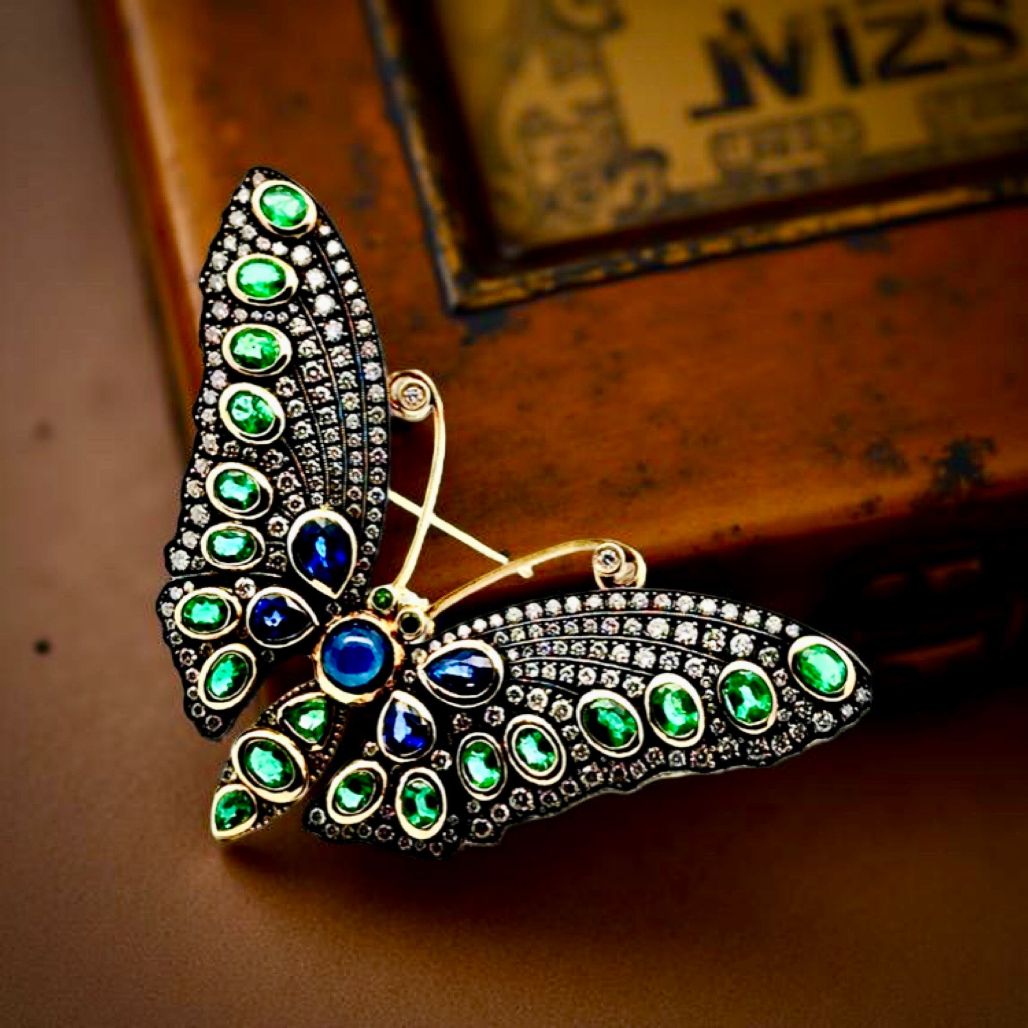 Estate Butterfly Brooch/Pendant, Round Brilliant Cut Diamond 2.95 cttw H-I SI1-SI2, 4 Sapphire Cabochon 4.14 cttw ,19 Emerald Mixed Cut 3.52 cttw  18K/Silver Yellow Gold