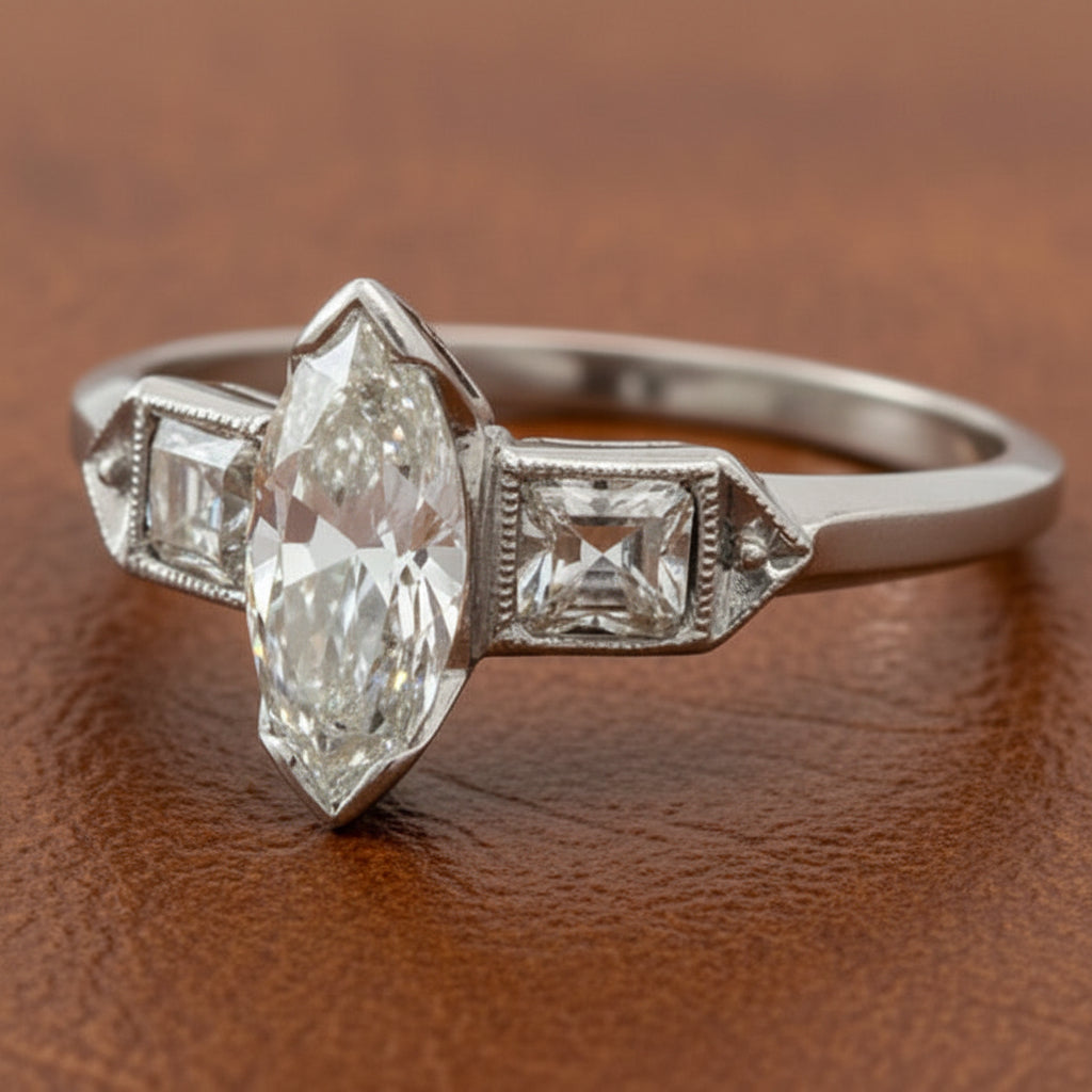 Estate Ring, Marquise Cut Diamond 0.60ct I SI2, Antique Cushion Cut Diamonds 0.35ct I-J VS2-SI1 Platinum 3.60g. All Weights Estimated.