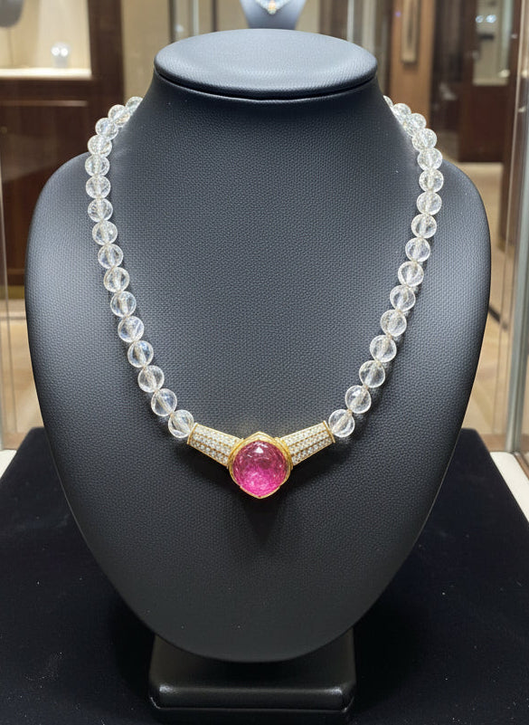 Estate Necklace, Round Brilliant Cut Diamonds G-H VS2-SI1, 1 Emerald Cabochon 0.50ct, 1 Rubellite Cabochon 10.00ct, 40 Rock Crystals Round, 18K Yellow Gold 15.00g. All Weights Estimated.