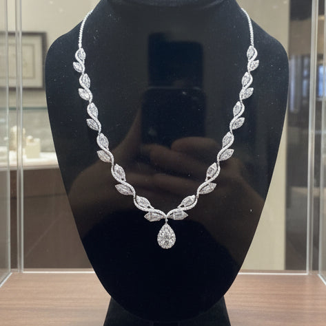 Estate Necklace, 1 Pear Shape Diamonds 1.15ct I-J VS2-SI1, Round/Baguette Cut Diamonds 5.00cttw H-I VS1-SI, Platinum 48.00g. All Weights Estimated.