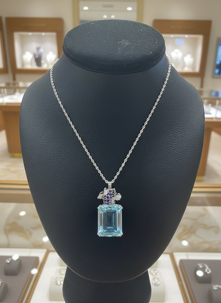 Necklace, 8 Round Brilliant Cut Diamonds 0.16cttw G-H VS2-SI1, 8 Sapphire Round 0.10cttw, 1 Aquamarine Emerald Cut 32.00ct, Platinum/14K White Gold 18.00g. All Weights Estimated.