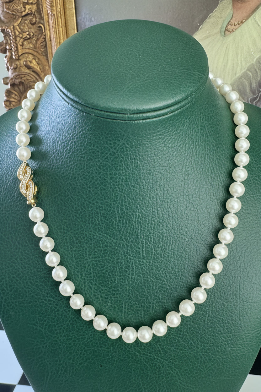  Necklace, Round Brilliant Cut Diamond 1cttw G-H VS1-VS2, 53 Akoya Cultured Pearl Round White-Rose Fine, 18K Yellow Gold 40.77g. All weights estimated.