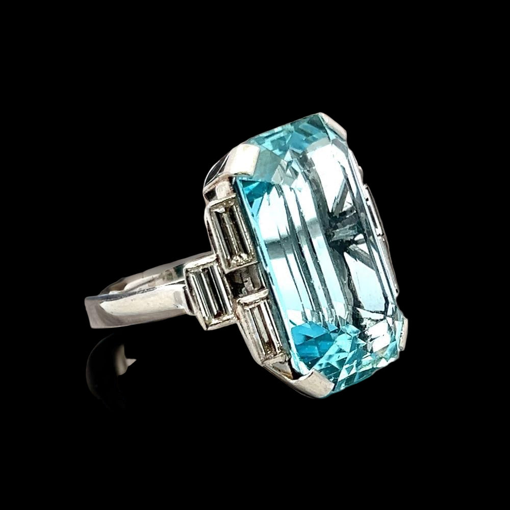 Estate Ring,  Aquamarine Cushion Modified 26.00 ct, 6 Baguette Cut Diamond 1.51 ct  G-H VS1-SI1,1  Platinum White Gold 13.08g