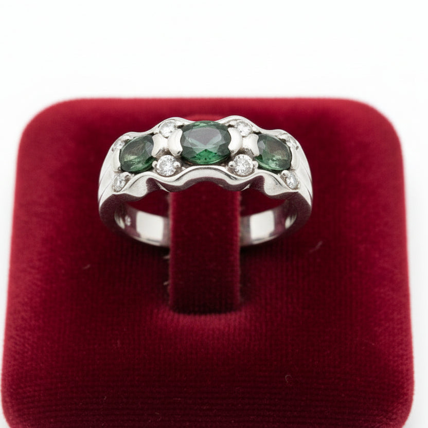Estate Ring, 8 Round Brilliant Cut Diamonds 0.25cttw H-I SI1-SI2, 3 Alexandrite Ovals 1.02cttw Bluish-Green to Purple Pink, Platinum 8.54g. Weights Estimated.
