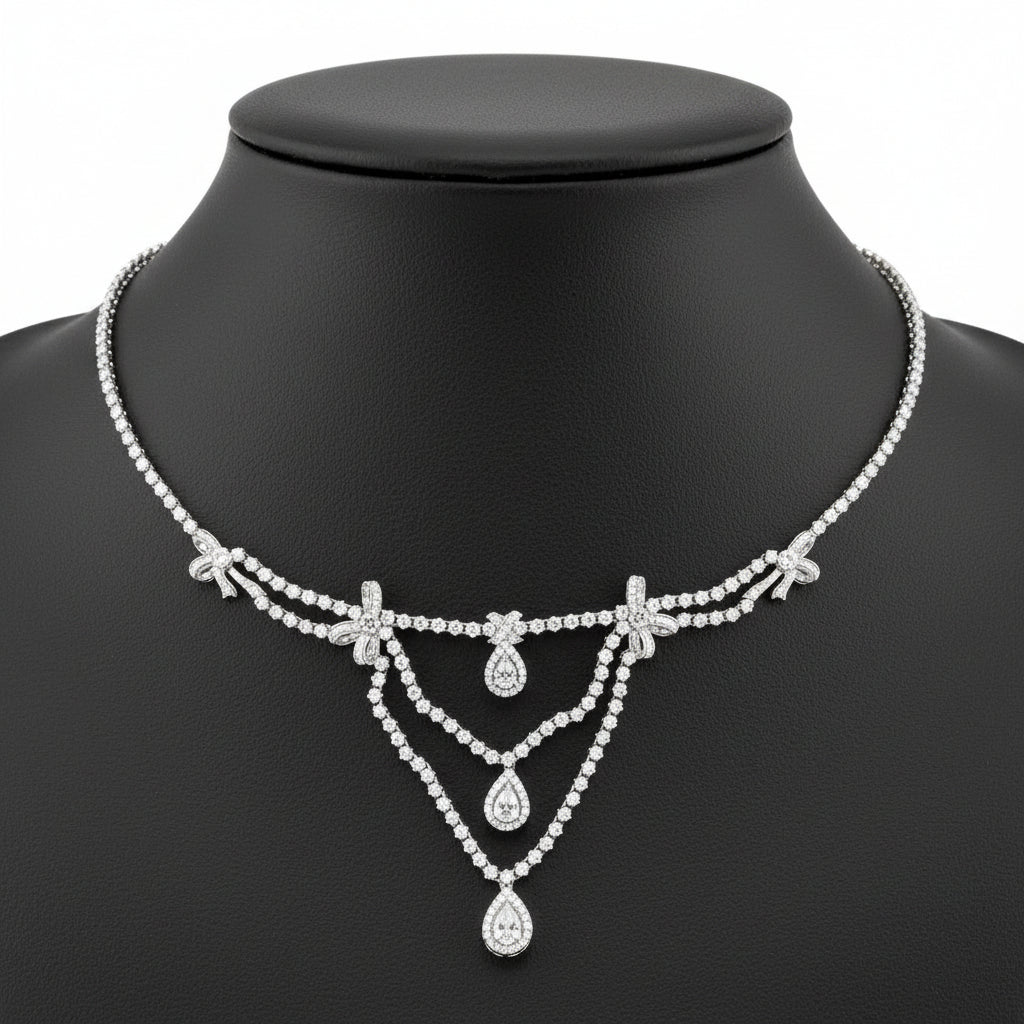 AKMS Necklace, RBC/Pear Diamonds 11.00cttw G-I VS2-SI2, 18K White Gold 38.60g. All Weights Estimated.