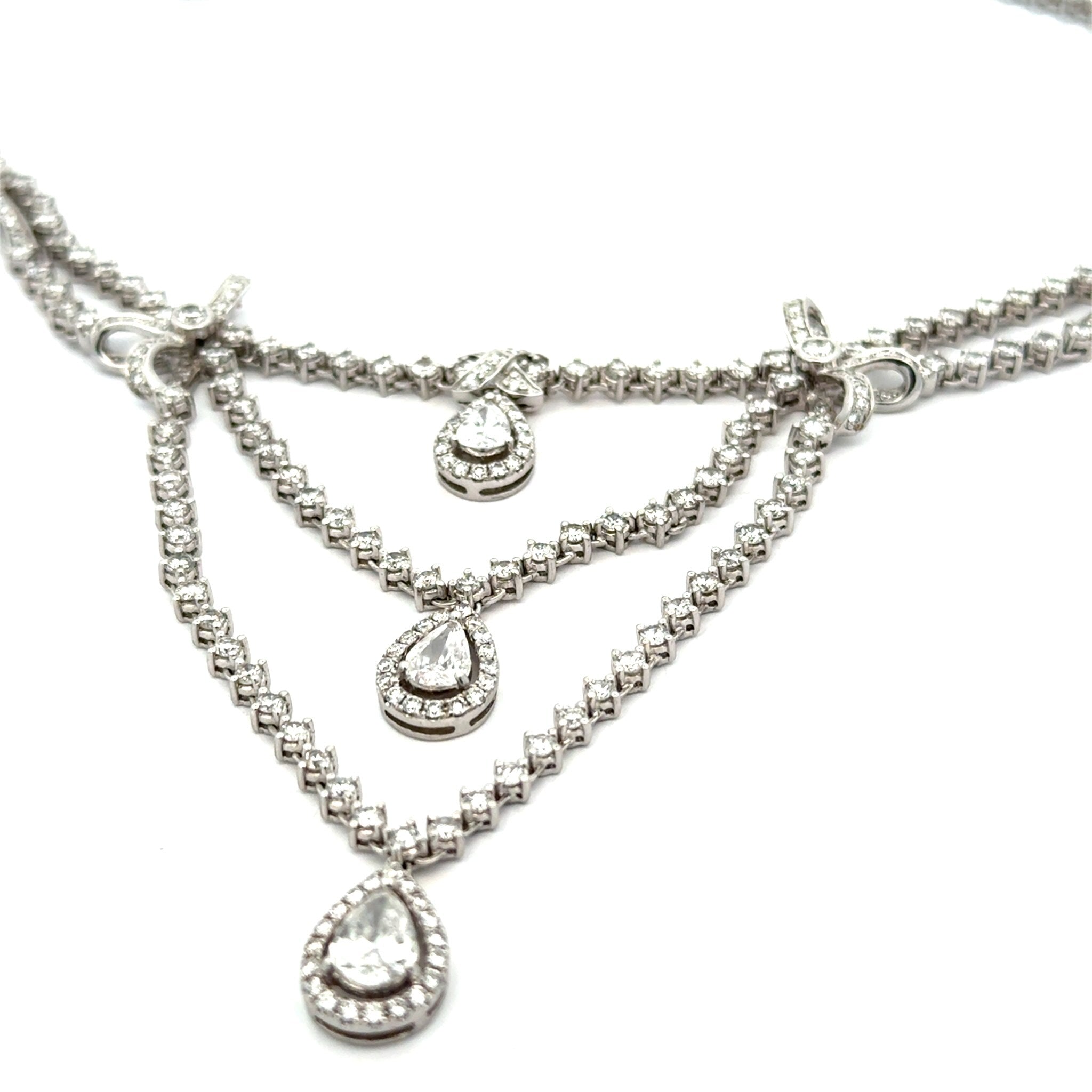 AKMS Necklace, RBC/Pear Diamonds 11.00cttw G-I VS2-SI2, 18K White Gold 38.60g. All Weights Estimated.
