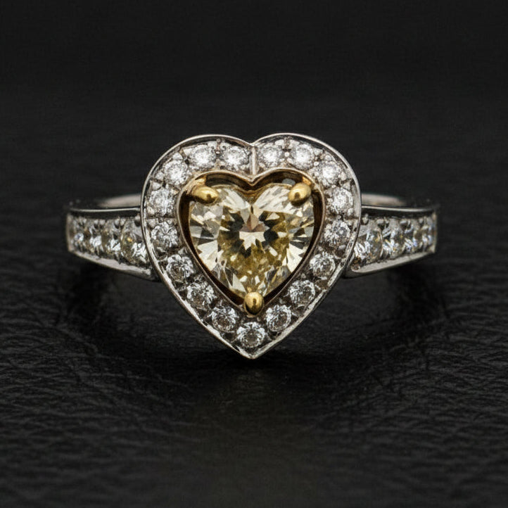 Estate Ring, Heart Shape Diamond 0.75ct P SI2, Round Brilliant Cut Diamonds 0.33cttw, 14K White Gold 18K Yellow Gold 7.20g, All Weights Estimated.