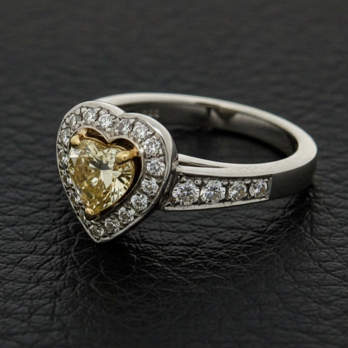 Estate Ring, Heart Shape Diamond 0.75ct P SI2, Round Brilliant Cut Diamonds 0.33cttw, 14K White Gold 18K Yellow Gold 7.20g, All Weights Estimated.