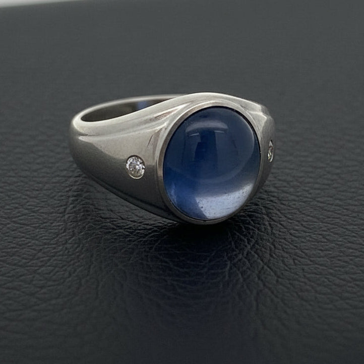 Estate Ring, 2 Round Brilliant Cut Diamonds 0.10ct F-G VS1-VS2, 1 Star Sapphire Cabochon 12.50ct #Sri Lankan, 14K White Gold 14.00g, Sarasota Gemologial Lab #17871-53, All Weights Estimated.