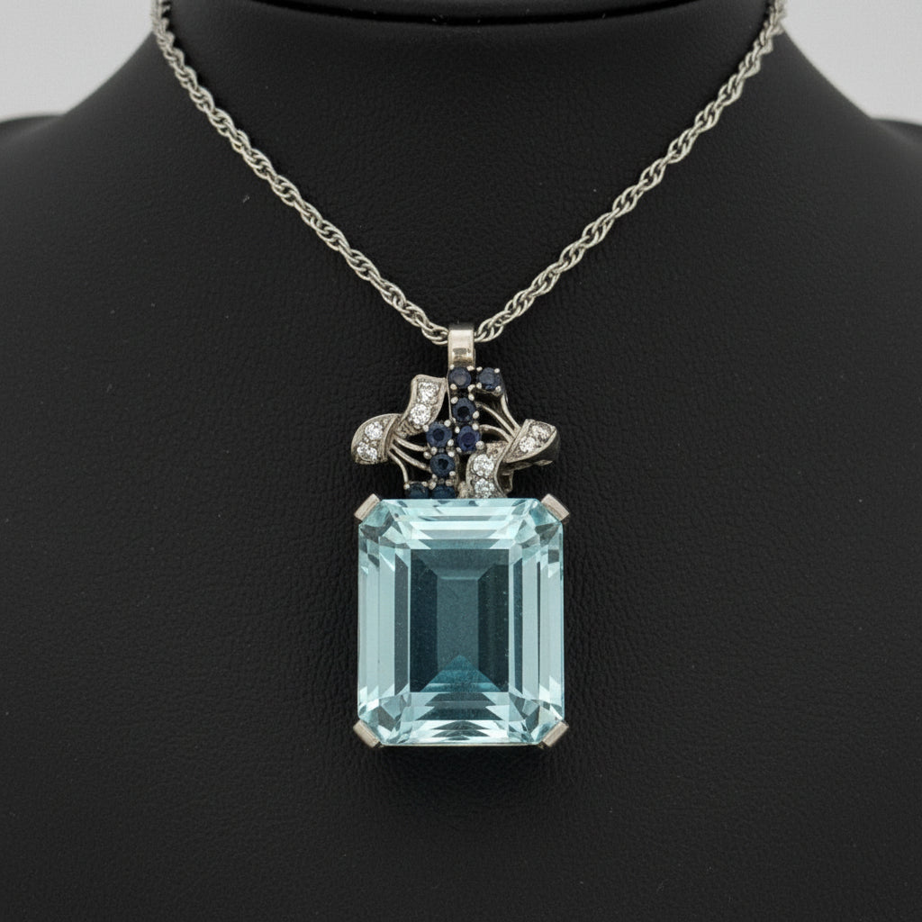  Necklace, 8 Round Brilliant Cut Diamonds 0.16cttw G-H VS2-SI1, 8 Sapphire Round 0.10cttw, 1 Aquamarine Emerald Cut 32.00ct, Platinum/14K White Gold 18.00g. All Weights Estimated.