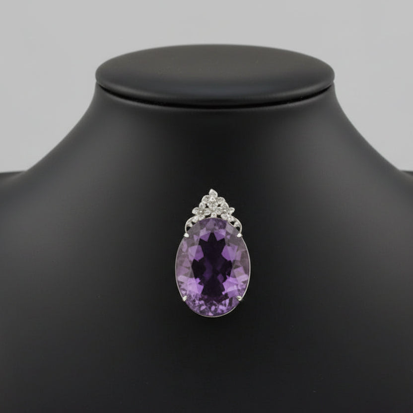 Pendant, 4 Round Brilliant Cut Diamonds 0.08cttw H-I SI1-SI2, 1 Amethyst Cabochon 58.41ct, 18K White Gold. All Weights Estimated.