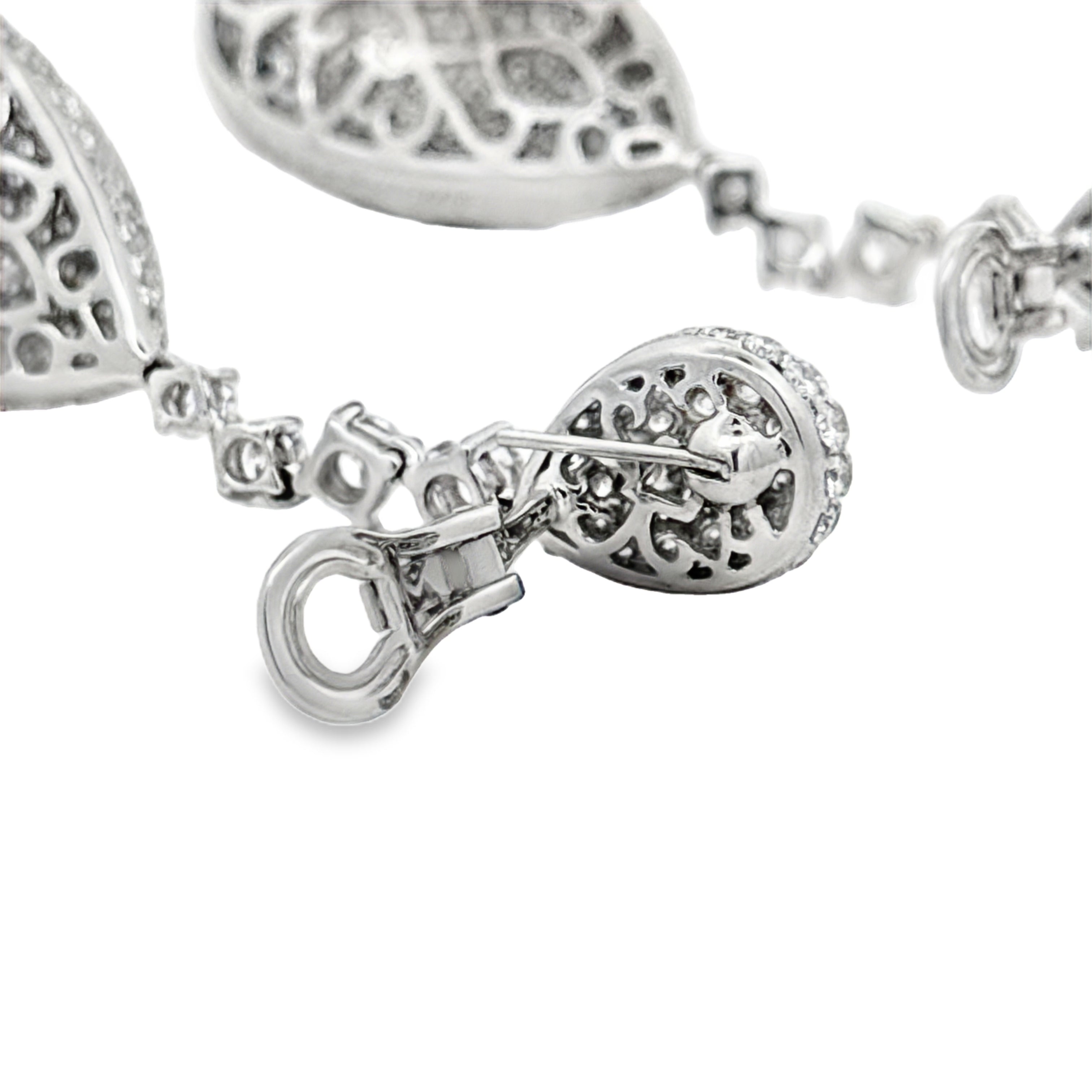 Private Manufacturer Earrings, 690 Round Brilliant Cut Diamonds 12.68cttw G-H SI1, 18K White Gold 28.00g. All Weights Estimated.