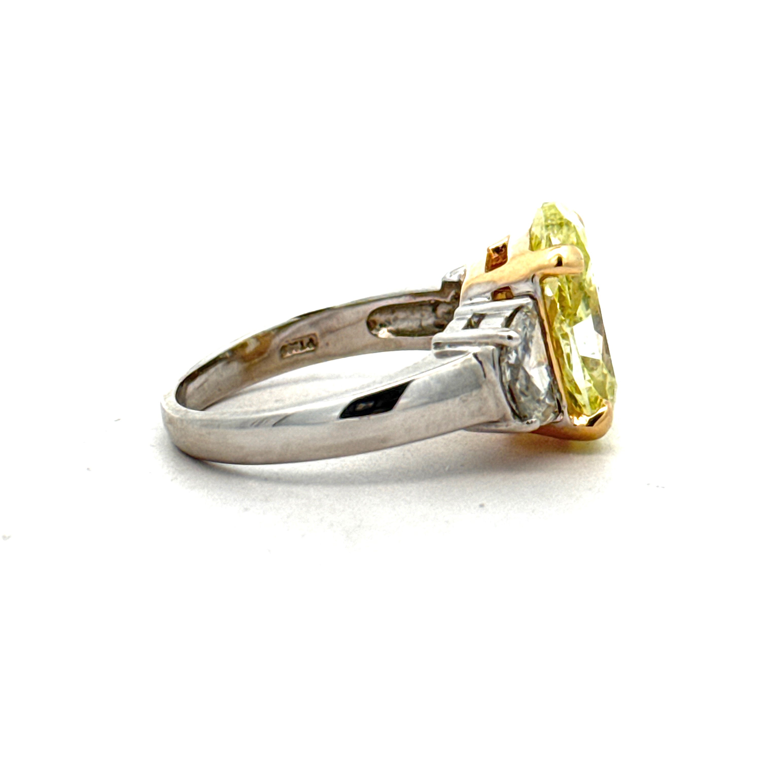 Estate Ring, 1 Oval Diamond 4.63 ct  Natural Fancy Green Yellow SI2 GIA 1232792484, 2 Half Moon Diamond 1.00 cttw  SI1-SI2, 18K/PLAT Yellow Gold 9.00g. All Weights Estimated.
