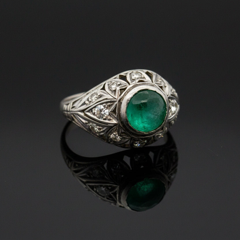 Estate Ring, 12 Round Brilliant Cut Diamonds 0.28ct I-J SI1-SI2, 1 Emerald Cabochon 1.50ct, Platinum 4.05 4.05g. All Weights Estimated.