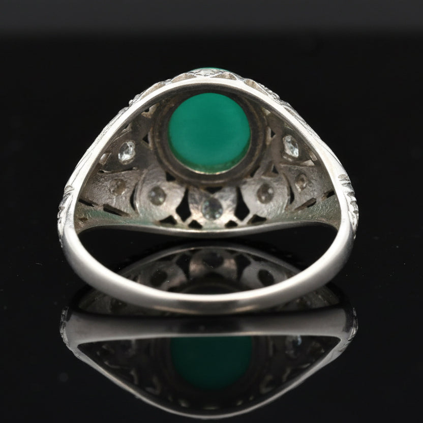 Estate Ring, 12 Round Brilliant Cut Diamonds 0.28ct I-J SI1-SI2, 1 Emerald Cabochon 1.50ct, Platinum 4.05 4.05g. All Weights Estimated.