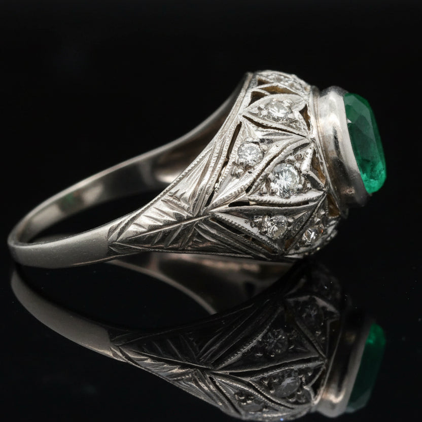 Estate Ring, 12 Round Brilliant Cut Diamonds 0.28ct I-J SI1-SI2, 1 Emerald Cabochon 1.50ct, Platinum 4.05 4.05g. All Weights Estimated.