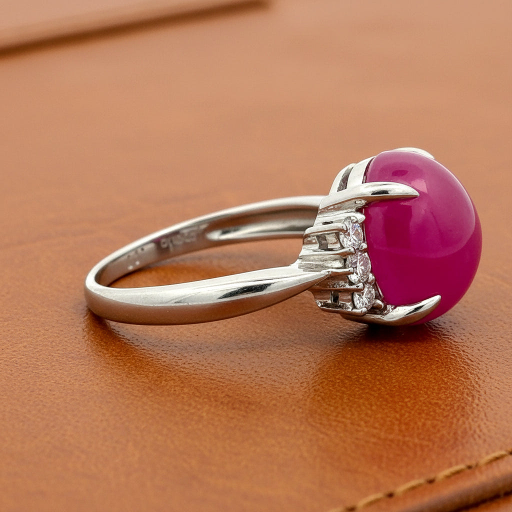 Estate Ring, 6 Round Brilliant Cut Diamond 0.20 cttw  G-H SI1-SI2,1 Ruby Cabochon 7.17 ct  Platinum 6.51g (All weight estimated)