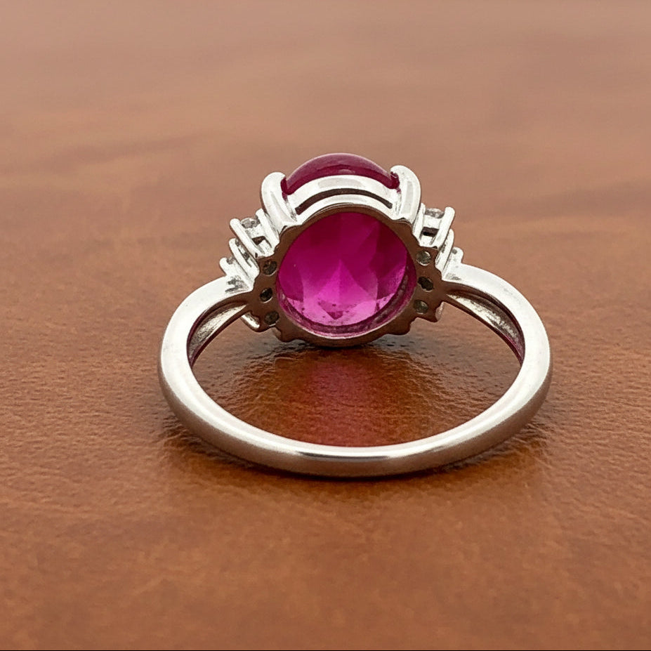 Estate Ring, 6 Round Brilliant Cut Diamond 0.20 cttw  G-H SI1-SI2,1 Ruby Cabochon 7.17 ct  Platinum 6.51g (All weight estimated)