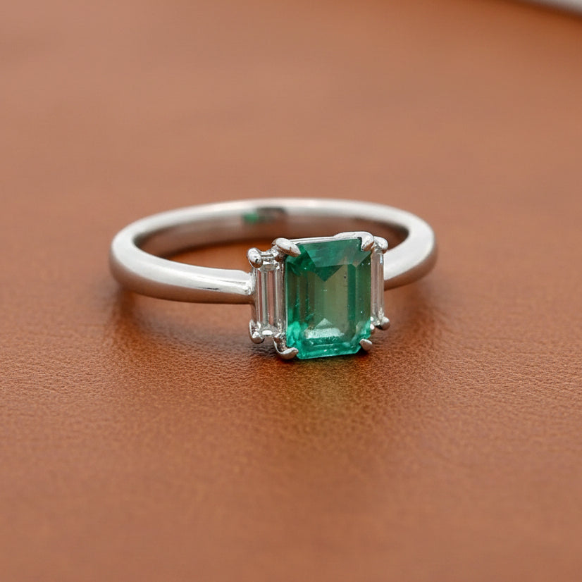 Estate Ring, 2 Baguette Cut Diamond 0.12 cttw H-I VS,1 Emerald Emerald Cut 0.81 ct  Platinum 5.50g (All Weights Estimated)