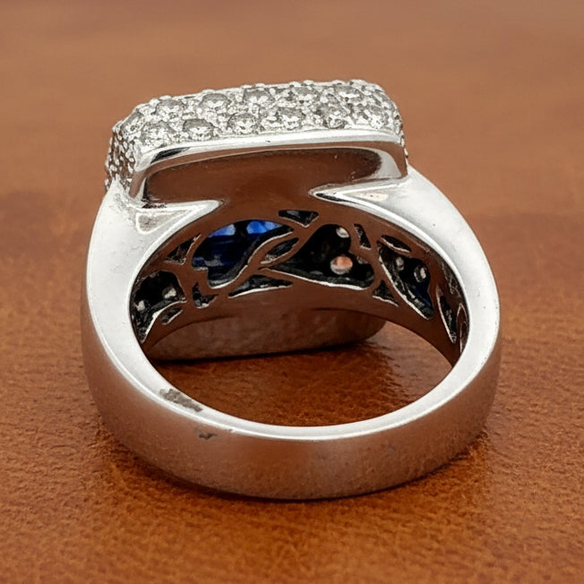R. TONE Ring, 92 Round Brilliant Cut Diamonds 1.72cttw G VS, 4 Sapphire Square 1.38ct, Platinum 19.12g, All weights estimated.