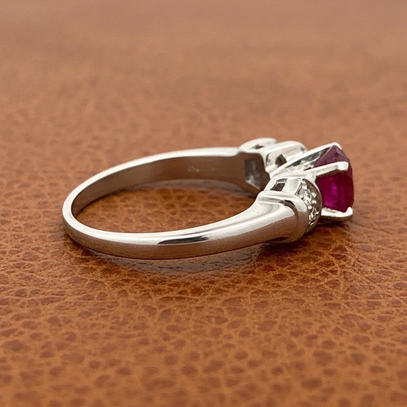Estate Ring, 6 Baguette Cut Diamonds 0.33cttw G-H VS2-SI1, 1 Ruby Oval 1.17ct, Platinum 6.22g. All Weights Estimated.