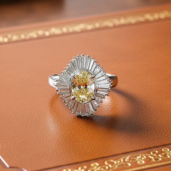 Estate Ring, 1 Oval Diamond 1.69 ct  Natural-FYL VS2, Baguette Cut Diamond 0.90 ct  H-I VS2-SI1 Platinum. All weights estimated.