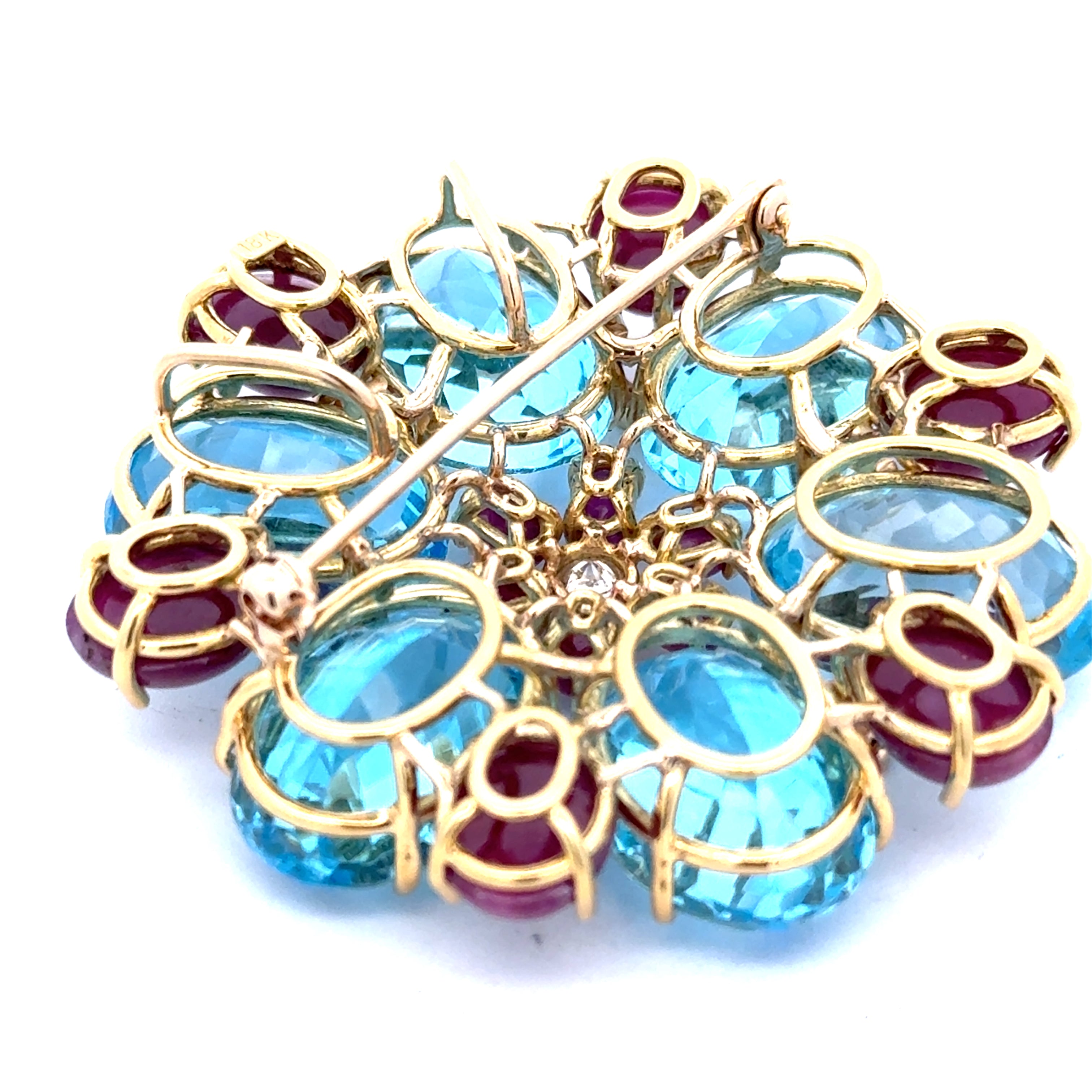 Italian Ring, 8 Round Brilliant Cut Diamond 0.85 cttw  I-J SI2-I1,7 Blue Topaz Oval 90.00 cttw ,12 Ruby  Oval Cabochon 12.00 cttw  18K Yellow Gold 46.13g. All weights estimated.