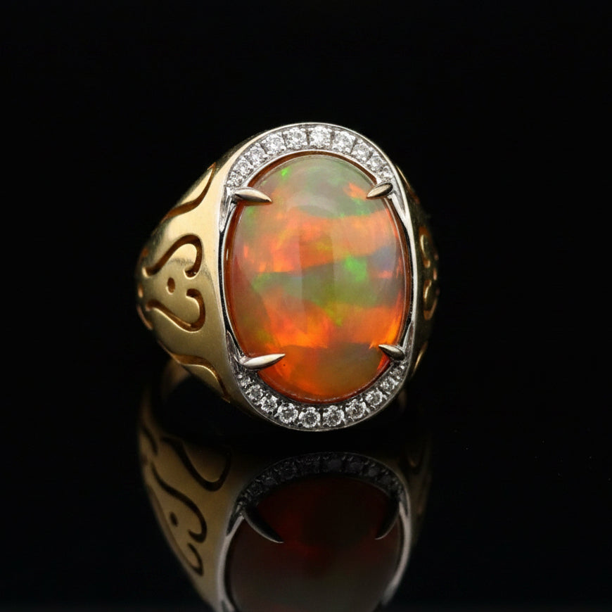 Spark Creations Ring, Round Brilliant Cut Diamond 0.17 cttw  F VS1,1 Ethiopian Opal Cabochon 8.36 ct  18K Yellow/White Gold 14.63g. All weights estimated.