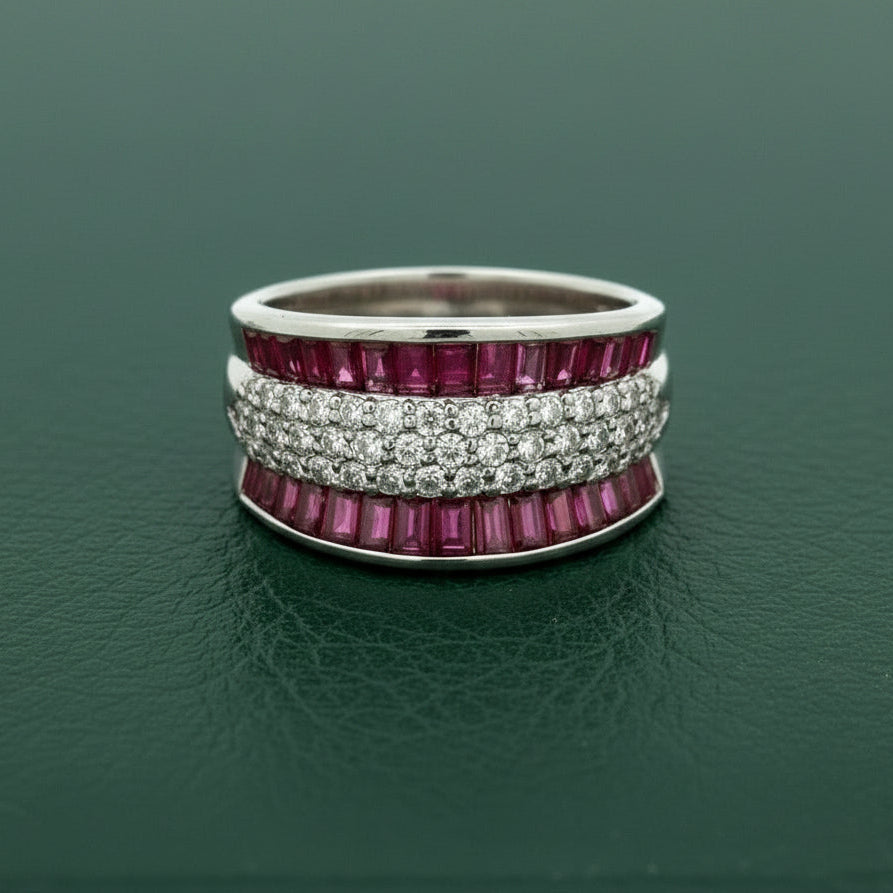 Estate Ring, Round Brilliant Cut Diamond 0.62cttw G-H VS2-SI1, Ruby Baguette Cut 2.10cttw  Platinum 9.14g. All weights Estimated.