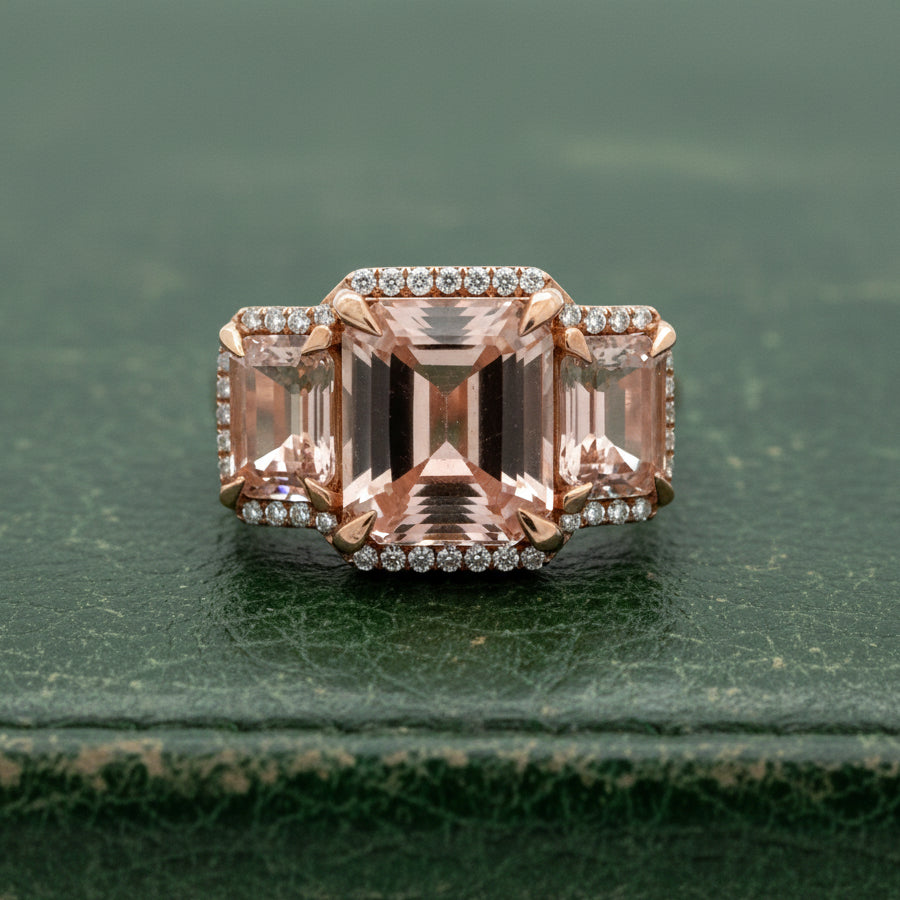 Estate Ring, Round Brilliant Cut Diamond 0.36ct, G-H VS2-SI2, 3 Morganite Emerald Cut 7.52cttw 18K Rose Gold 7.45g. All weights estimated.