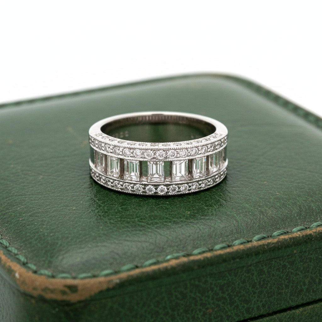 Estate Ring, Round/Baguette Cut Diamond 0.86cttw G-H VS2-SI. 18K White Gold 8.83g. All Weights Estimated.