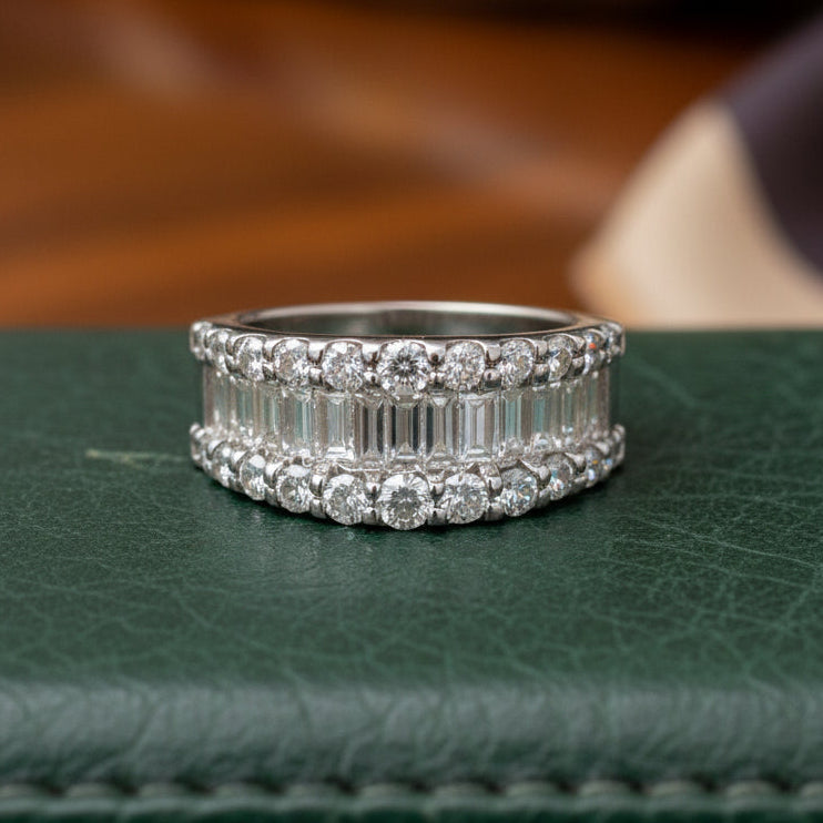 Estate Ring, Round/Baguette Cut Diamond 2.00cttw G-H VS2-SI1, Platinum 5.69g. All Weights Estimated.