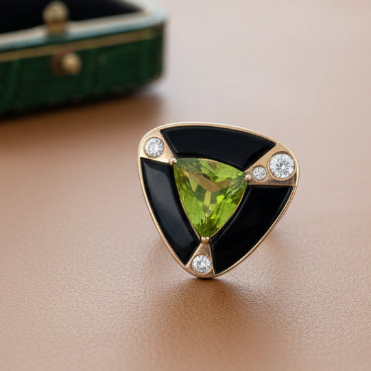 Designer Cole Pendant, 4 Round Brilliant Cut Diamond 0.60 cttw G-H VS2-SI2,1 Tril Peridot 6 cttw , Onyx Free Form Weight Unknown 14K Yellow Gold 9.56g. All weights estimated.